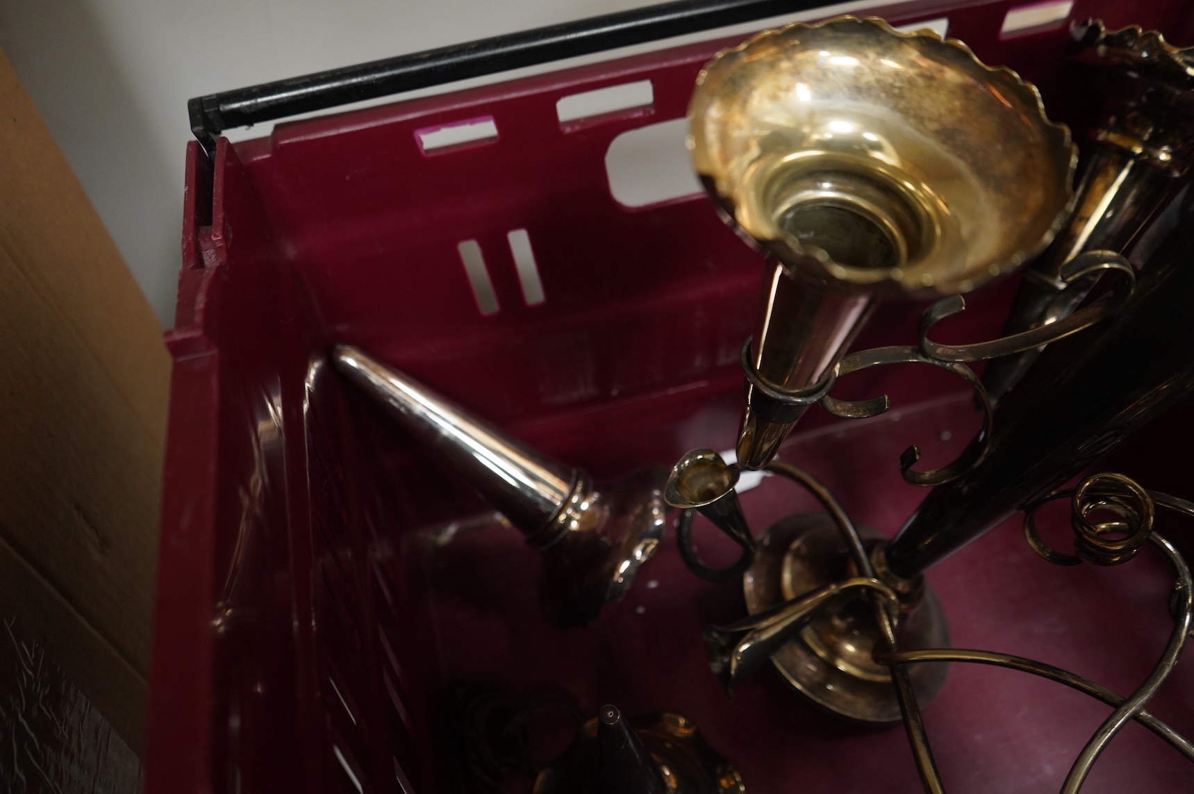 Three silver plated epergnes to include a naturalistic example decorated with leaves and vines